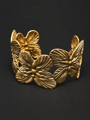 sculpted-butterfly-open-cuff-bangle-1.webp Gold-tone butterfly-inspired open cuff bangle
