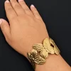 sculpted-butterfly-open-cuff-bangle-worn-1.webp Sculpted Butterfly Open Cuff Bangle