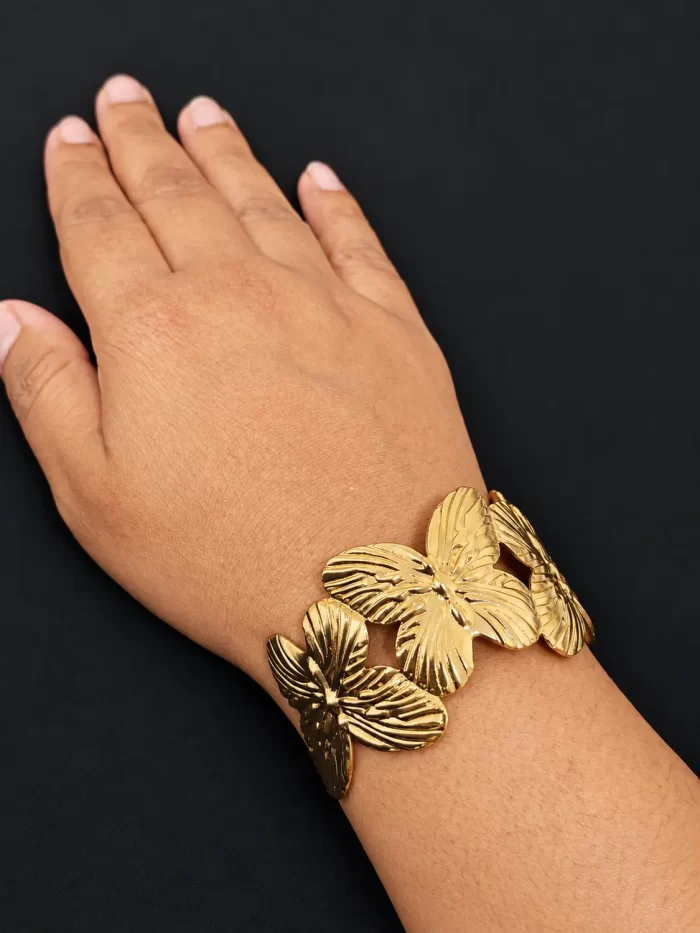 sculpted-butterfly-open-cuff-bangle-worn-1.webp Sculpted Butterfly Open Cuff Bangle