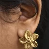 sculpted-flower-statement-earrings-worn-1.webp Sculpted Flower Statement Earrings