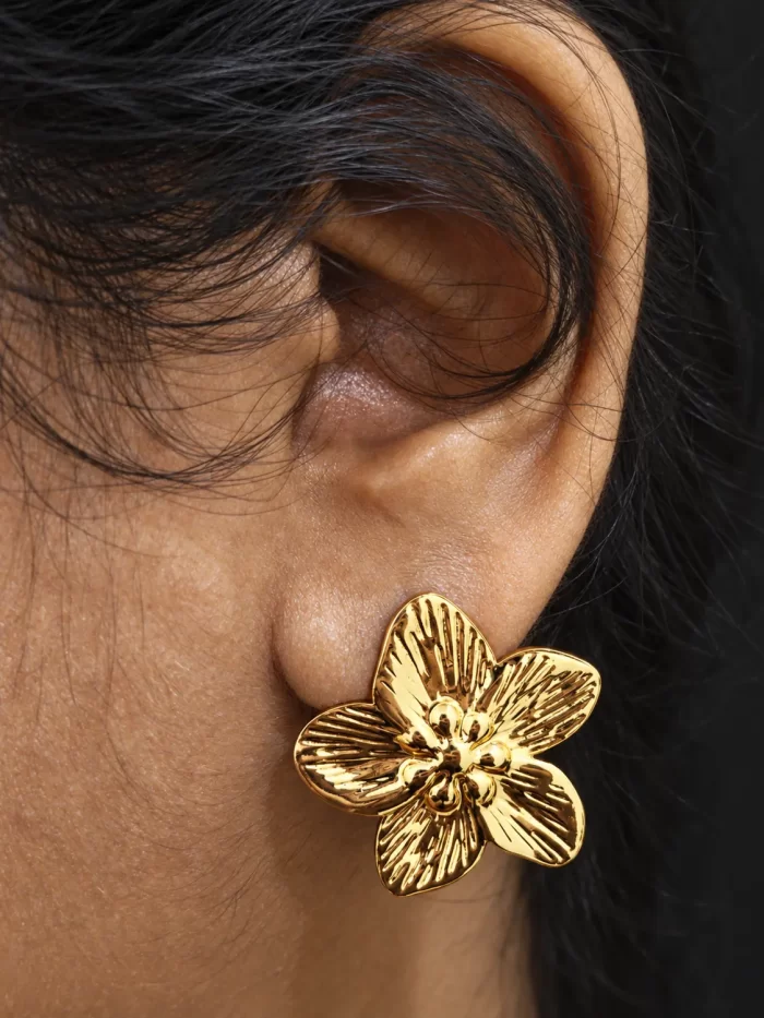 sculpted-flower-statement-earrings-worn-1.webp Sculpted Flower Statement Earrings