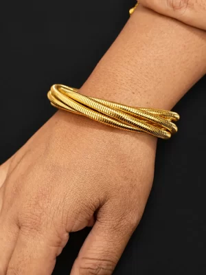 triple-snake-chain-bangle-set-1.webp Set of three gold-tone snake-chain bangles